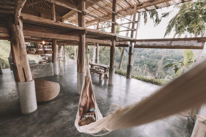 A woman lying on a hammock